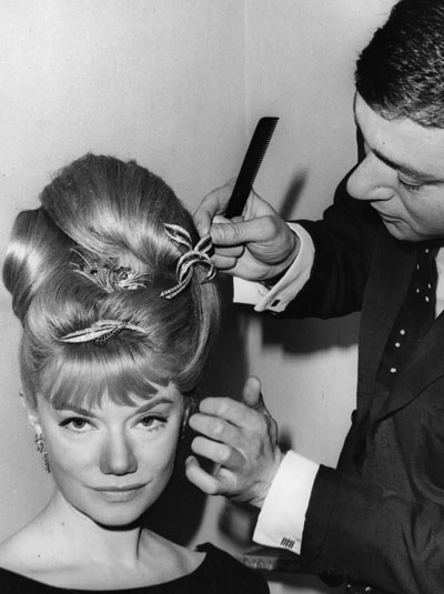 Vidal Sassoon putting the dressing into hairdressing