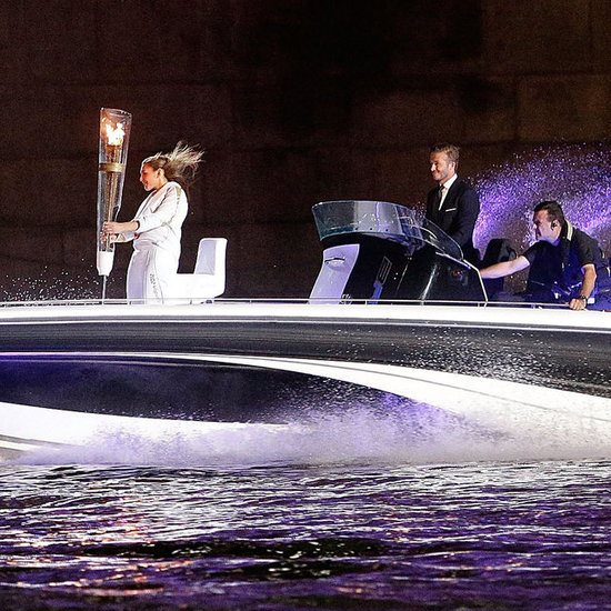 David-Beckham-Driving-Olympic-Torch-Boat-Opening-Ceremony