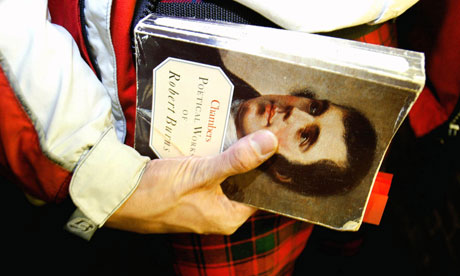 Man in a kilt with a Robert Burns book - www.leblow.co.uk