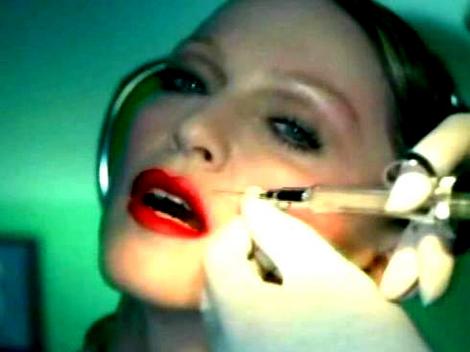 Madonna gets an injection of Botox in her clip for Hollywood